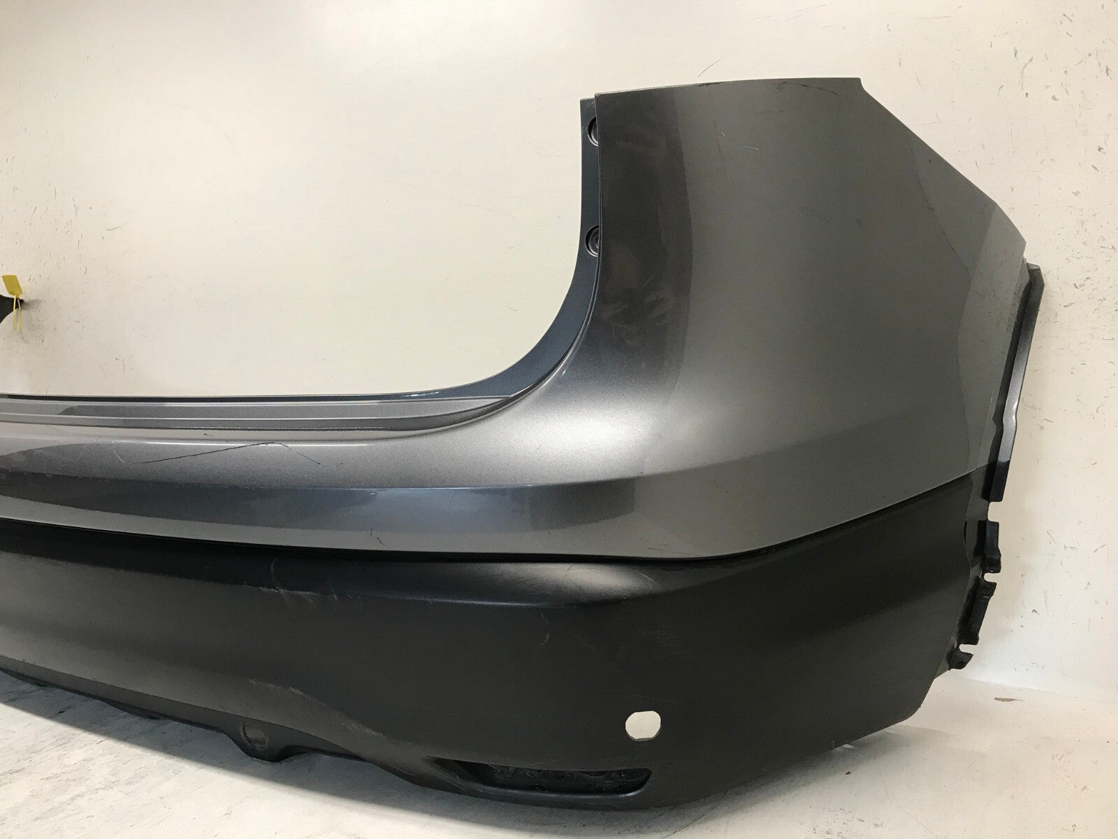 Rear Bumper Cover Gray Nissan Rogue Sport S/SL/SV 2017-2019 w/Sensor Holes OEM