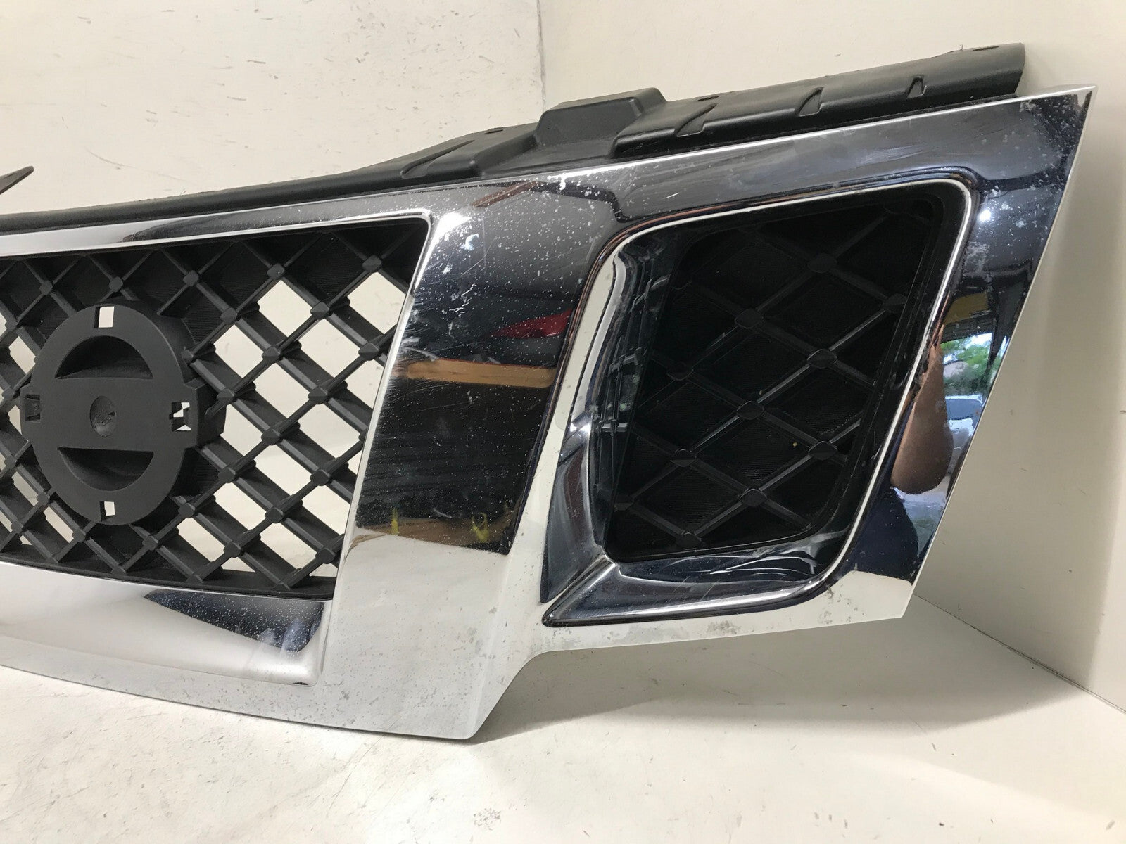 Grill Grille 2009-2020 Nissan Frontier 62310-9BA0A OEM