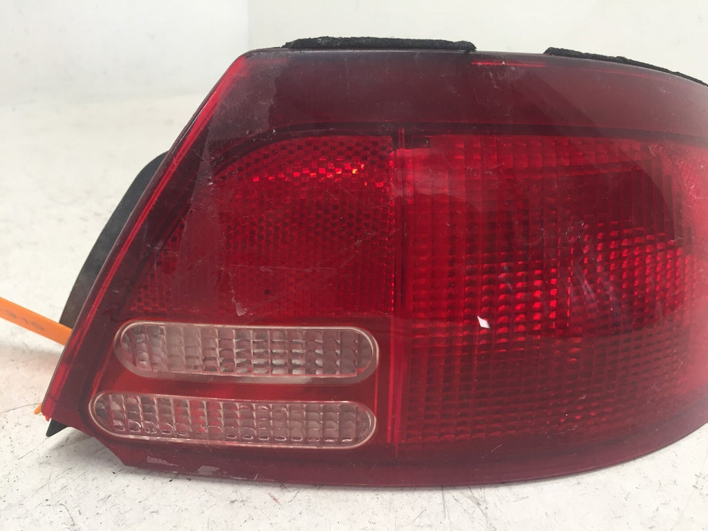 Tail light Damaged Left Driver LH Mercury Tracer Sedan 99-02 F8CB-13B504-CA OEM