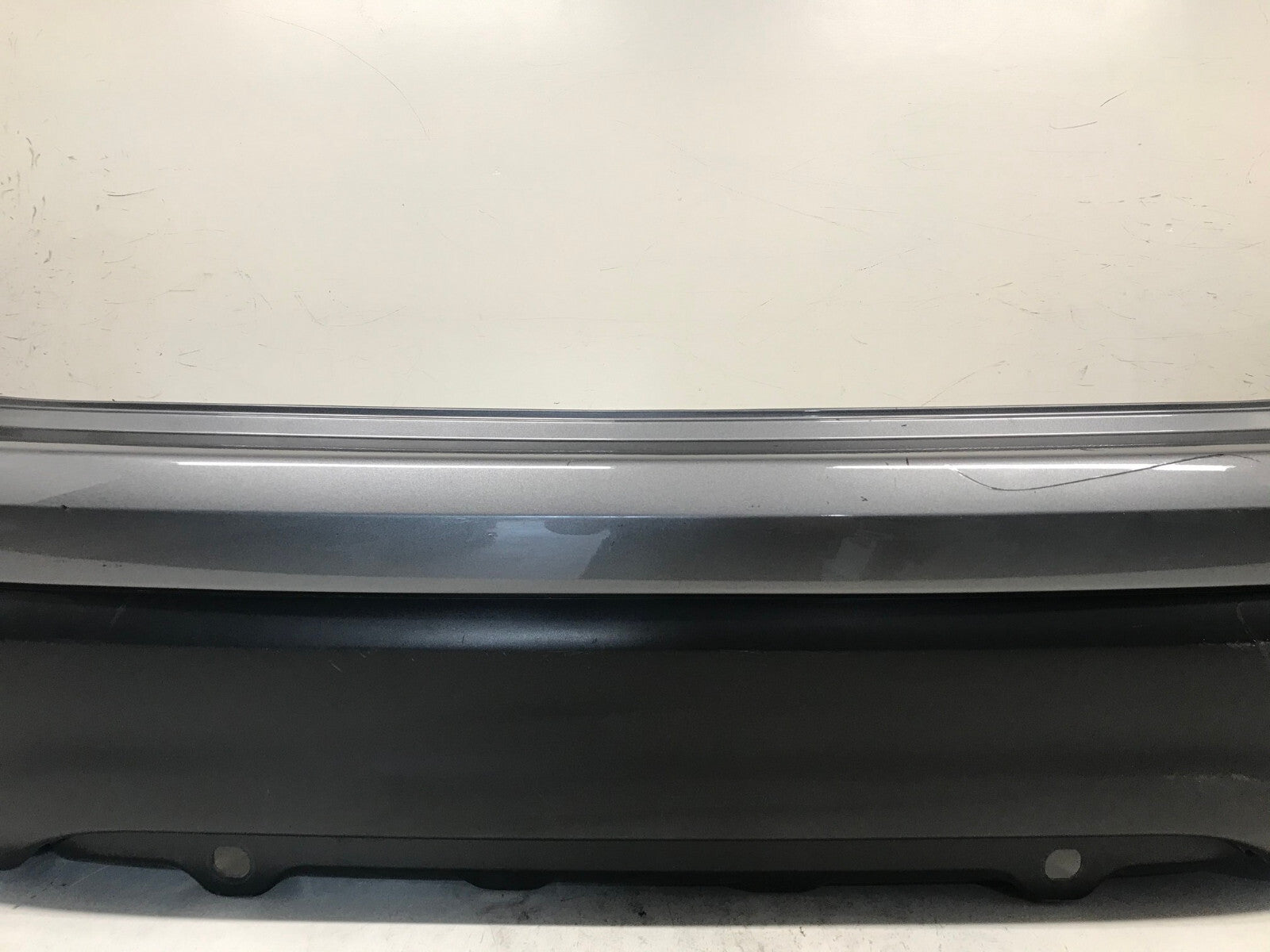 Rear Bumper Cover Gray Nissan Rogue Sport S/SL/SV 2017-2019 w/Sensor Holes OEM