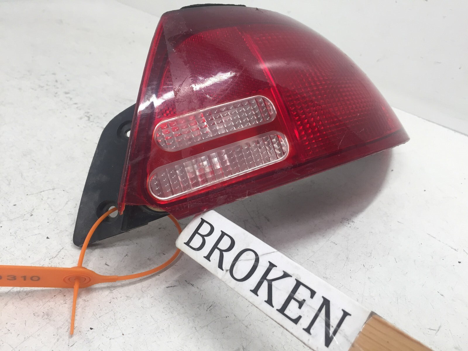 Tail light Damaged Left Driver LH Mercury Tracer Sedan 99-02 F8CB-13B504-CA OEM