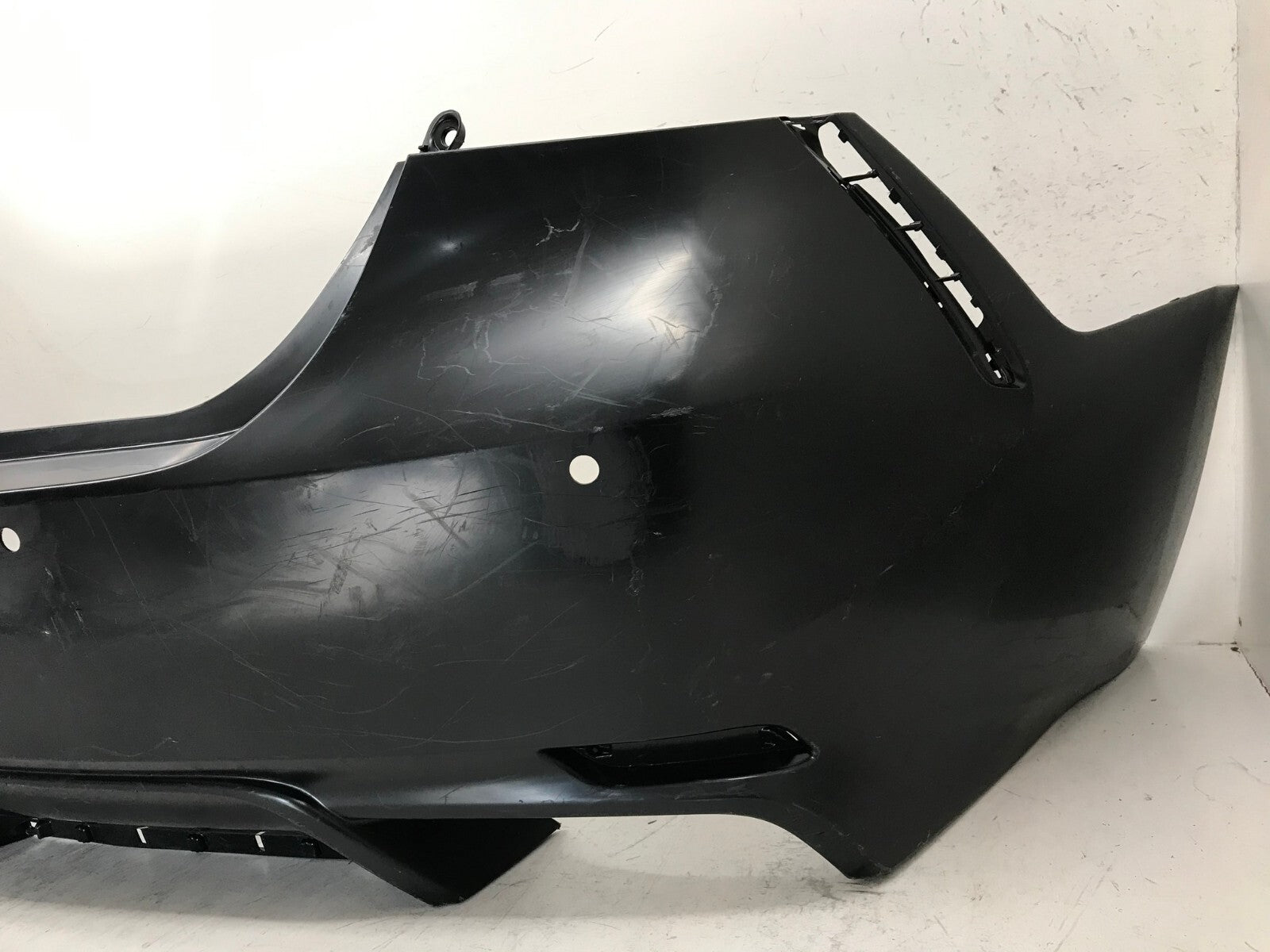 Rear Bumper Cover Unpainted 18-21 Toyota Camry SE/XSE/Hybrid w/Sensor Holes OEM