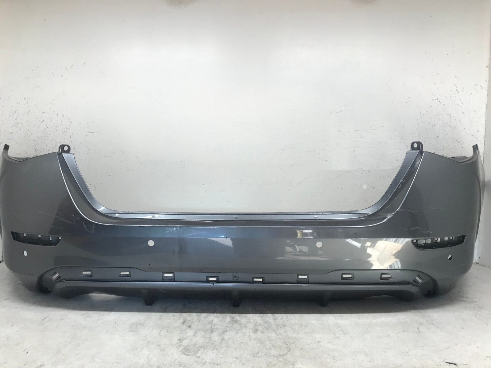 Rear Bumper Cover Gray 2020 2021 Nissan Sentra S/SV w/Sensor Holes OEM