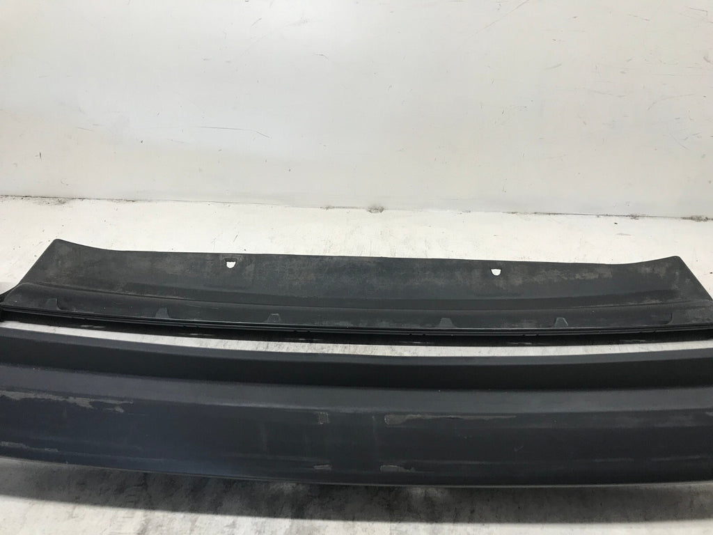 Rear Bumper Cover Black 2021-2022 Nissan Rogue Sport S/SV/SL w/Sensor Holes OEM
