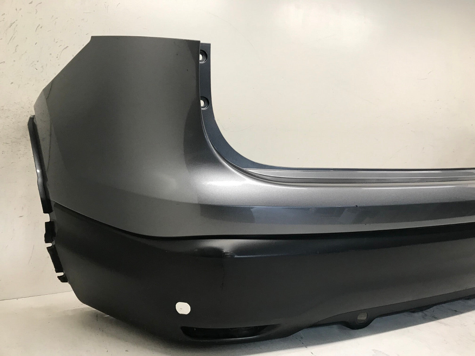 Rear Bumper Cover Gray Nissan Rogue Sport S/SL/SV 2017-2019 w/Sensor Holes OEM