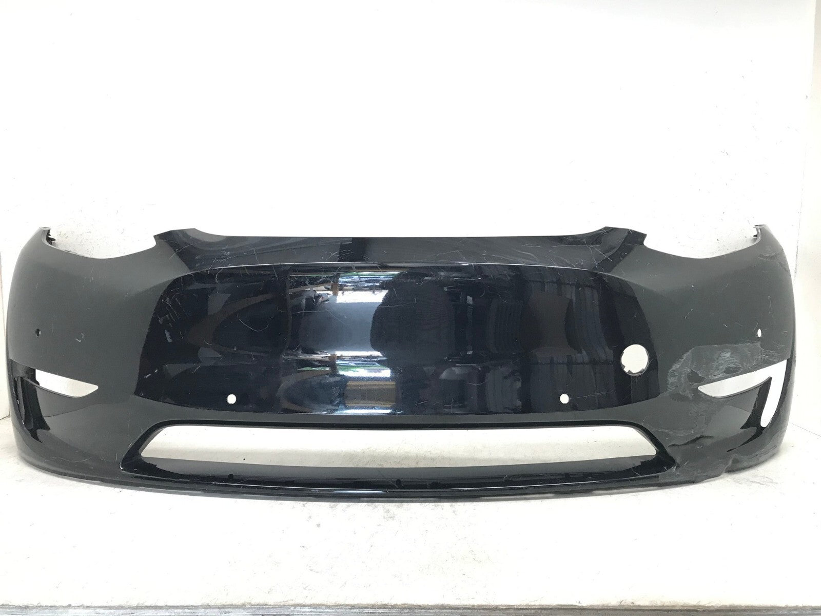 Front Bumper Cover Black 2020-2022 Tesla Model Y Long Range w/Sensor Holes OEM