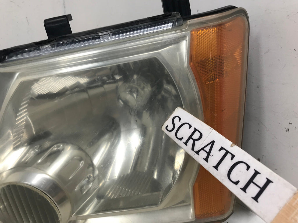 Headlight Damaged Left Driver LH Nissan Xterra 2005-2015 26060EA025 OEM